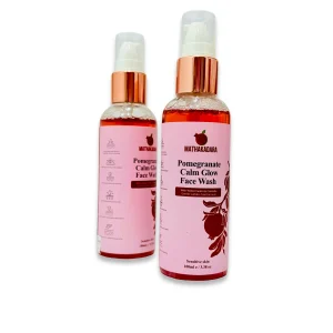 Mathakadara Pomegranate Calm Glow Face Wash bottles with elegant pink skincare packaging designed for sensitive skin care and gentle cleansing