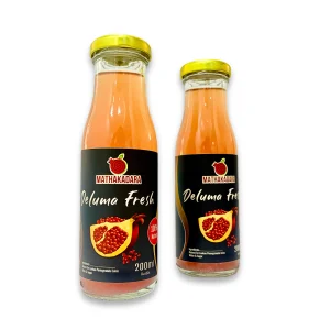 Two bottles of Mathakadara Deluma Fresh natural pomegranate juice displayed together