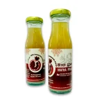 Two bottles of Mathakadara Matha Prana natural pomegranate herbal drink displayed together